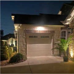 Outdoor garage with elegant lighting fixtures