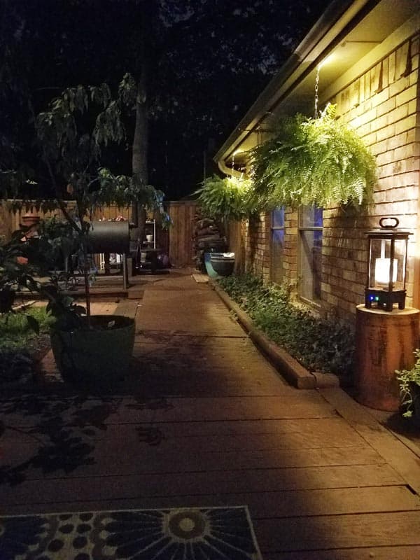 A patio at night lit up by LEDs.