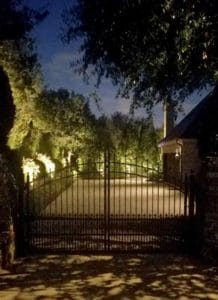 Security Lighting illuminates the entry points of an upscale home