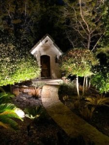 outdoor lighting on a pathway leading to a front door