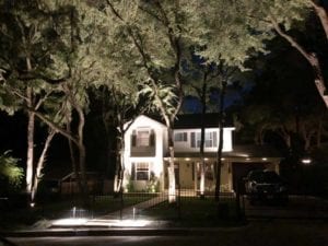 outdoor lighting shining on a home