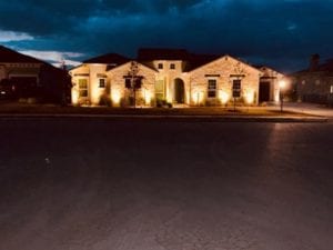 outdoor lighting shining on a home
