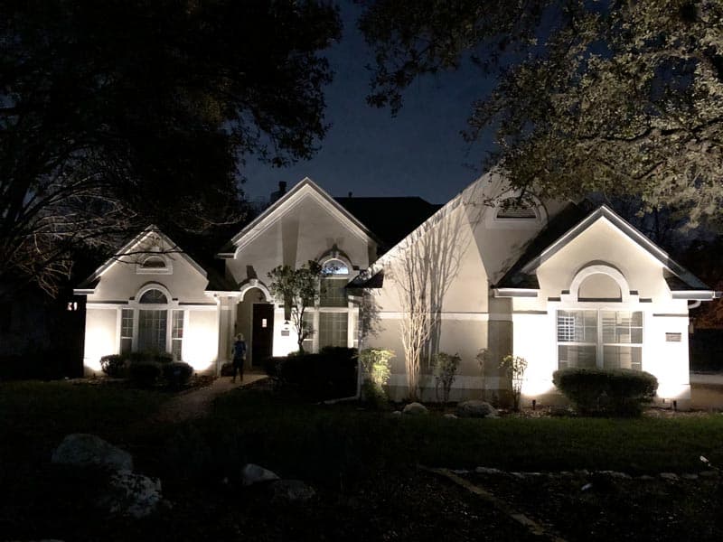 Landscape lighting on the front of a home.