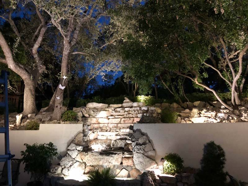 Gorgeous outdoor lighting highlighting a garden.