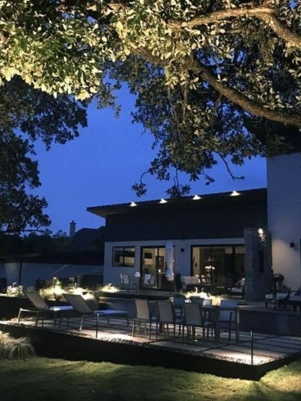 A home with its patio lit to extend the usage hours.